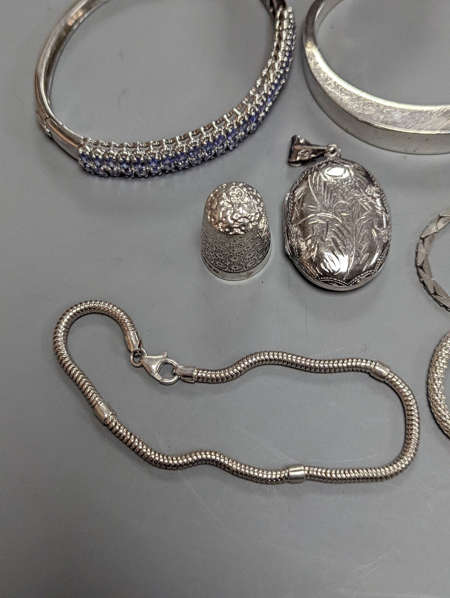 A quantity of assorted jewellery etc. including Danish sterling bangle and leaf brooch, a white meta and niello bracelet and a 925 and enamel flower brooch.